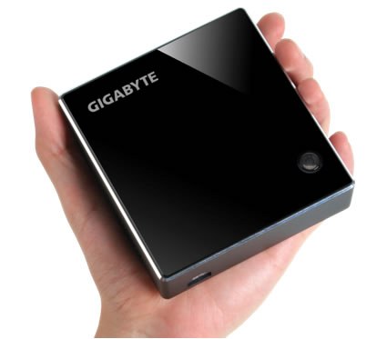 A compact Gigabyte mini computer held in one hand